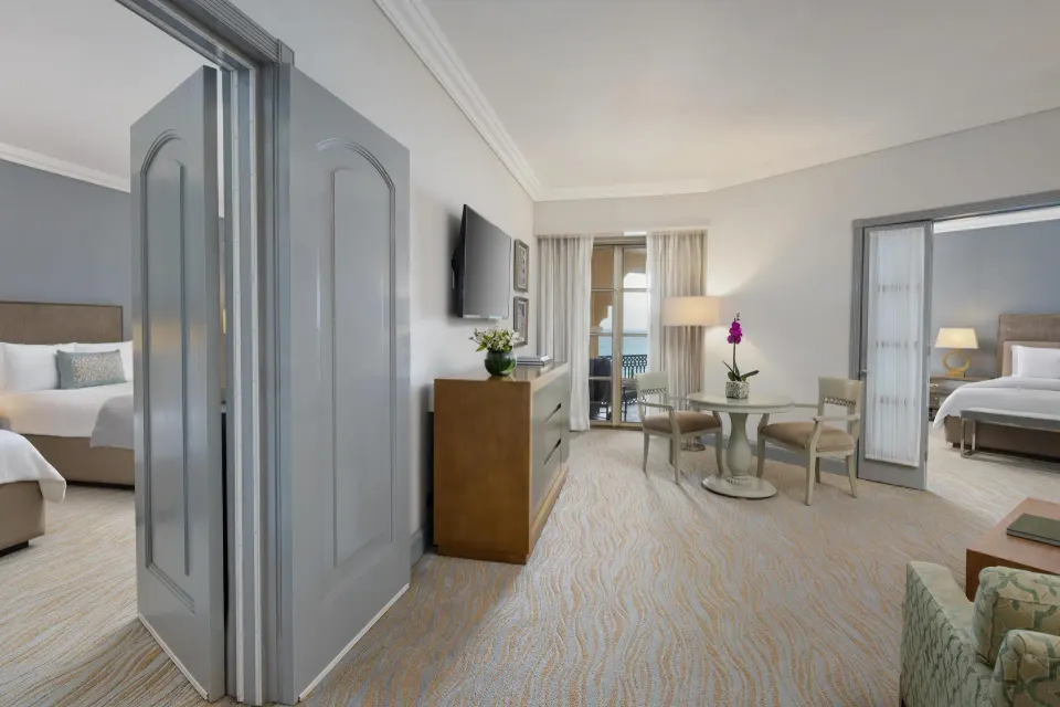 Seaside suite living area and bedroom doors at Kempinski Hotel Cancún.