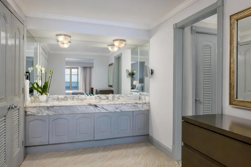 Seaside suite vanity area with marble counter at Kempinski Hotel Cancún.