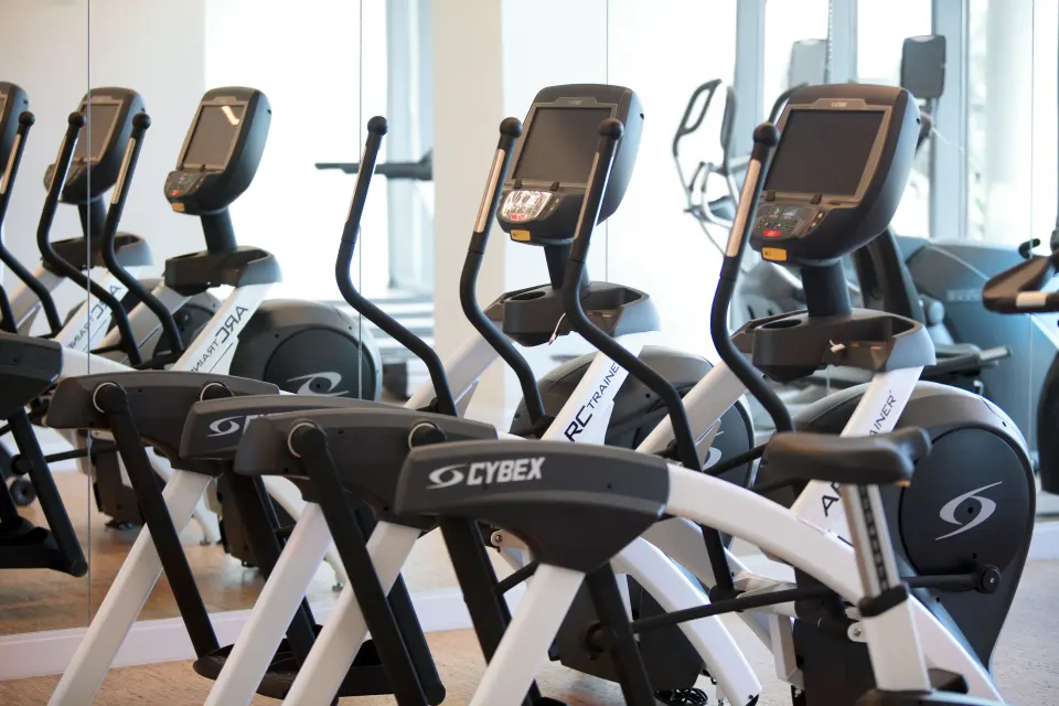 Close-up of stationary cardio machines in the gym at Kimpton Seafire Resort + Spa