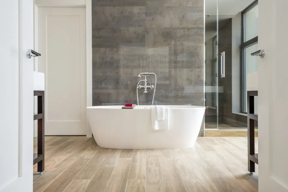 Freestanding bathtub in a resort bathroom at Kimpton Seafire Resort + Spa.
