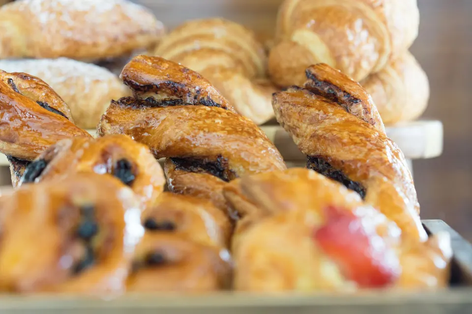 Assorted glazed pastries on display at Kimpton Seafire Resort + Spa
