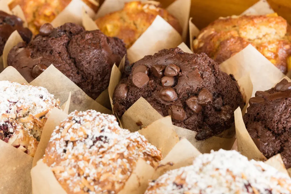 Assorted muffins in paper liners at Kimpton Seafire Resort + Spa