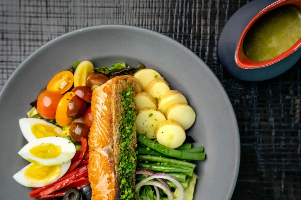 Pan-seared salmon salad with potatoes and green beans at Kimpton Seafire Resort + Spa