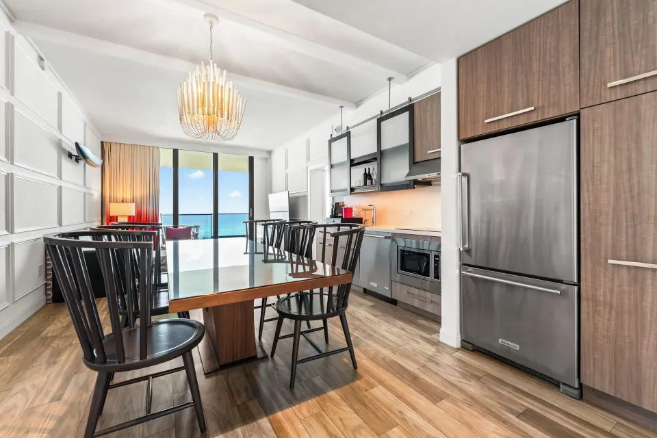 Kitchenette, dining table and ocean view from an Oceanfront One-Bedroom Suite at Kimpton Seafire Resort + Spa
