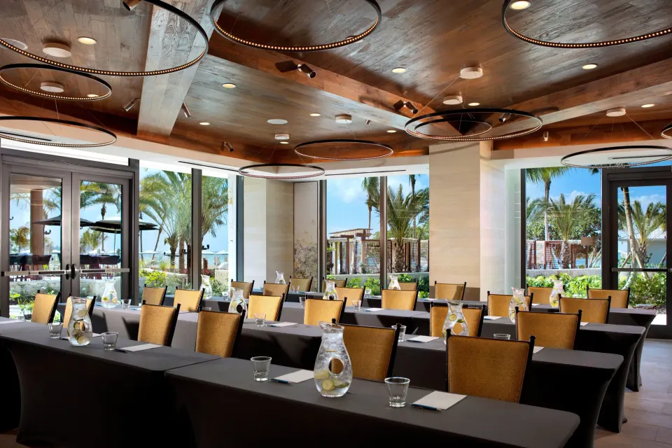 Conference room with circular ceiling lights and ocean view at Kimpton Seafire Resort + Spa