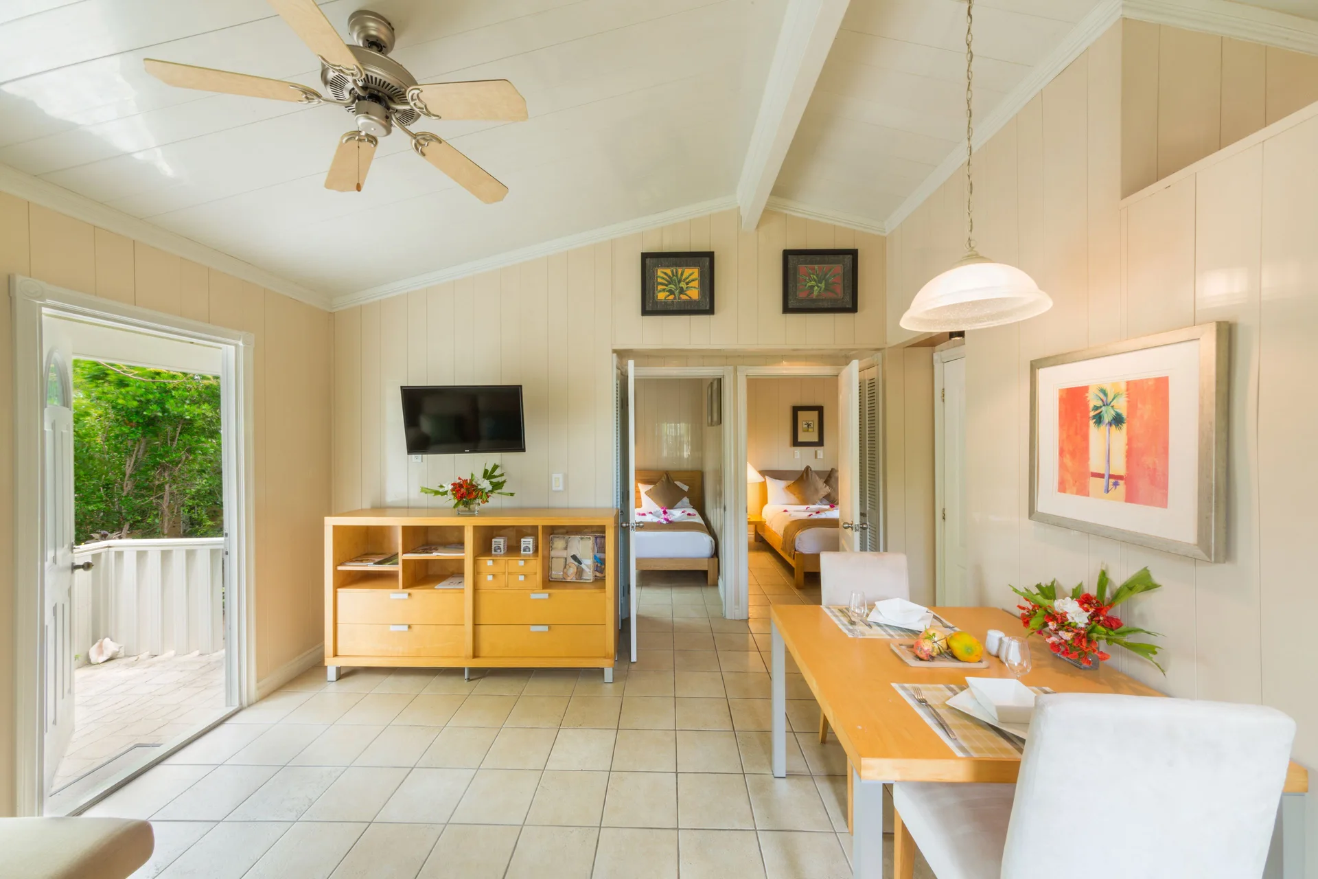 Classic Cottage Two Bedrooms Garden View at Kokomo Botanical Resort with dining area, bedroom views, and tropical garden ambiance in Fiji.