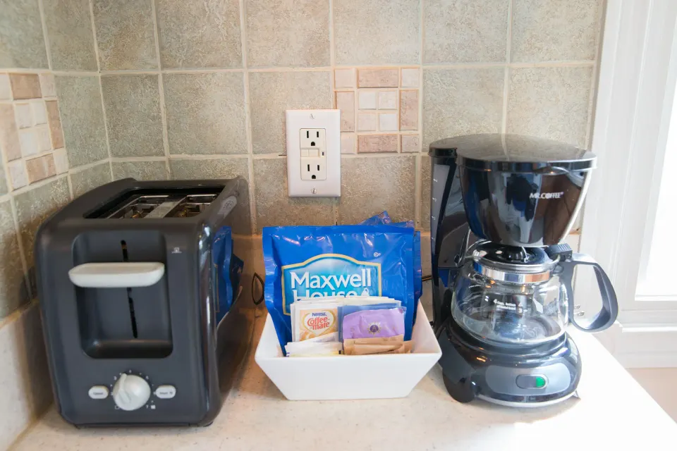 Toaster and coffee station on the cottage kitchen counter at Kokomo Botanical Resort.