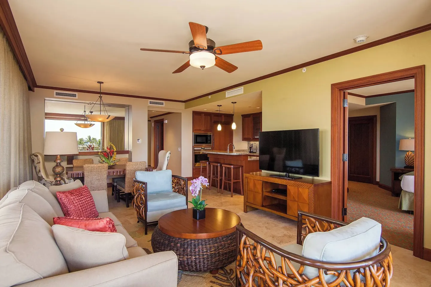 Suite living room with dining area and kitchen at Koloa Landing Resort at Poipu.