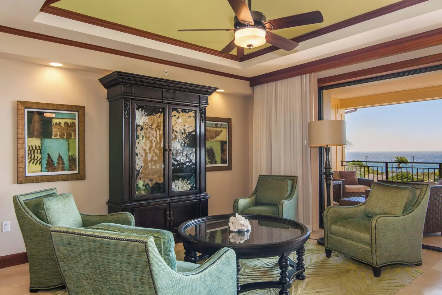 Sitting area with balcony and ocean view at Koloa Landing Resort at Poipu.