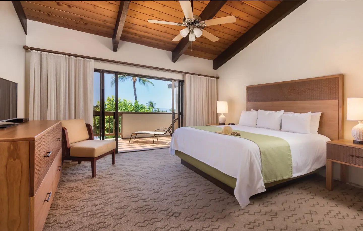 One Bedroom Villa Honu king bedroom with lanai at Kona Coast Resort.