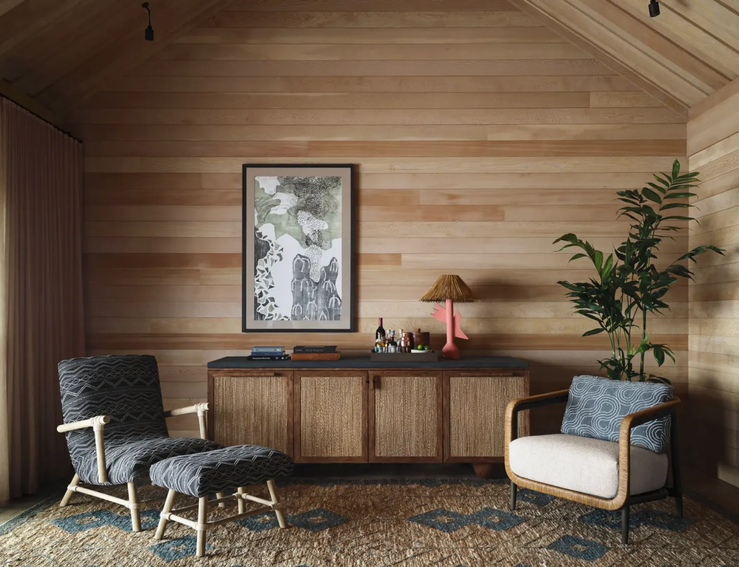Wood-paneled sitting area in a Garden View One Bedroom Kauhale at Kona Village.