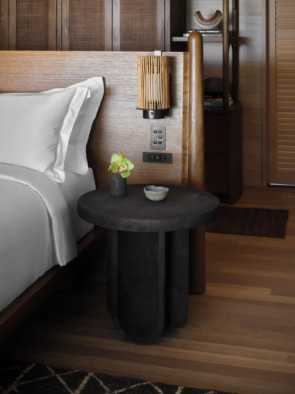 Mountain View One Bedroom Kauhale bedside table and lamp at Kona Village.