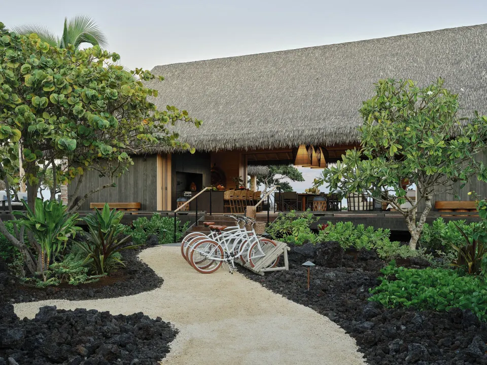 Thatched exterior of Ocean Front Four Bedroom Maheawalu Kauhale at Kona Village.