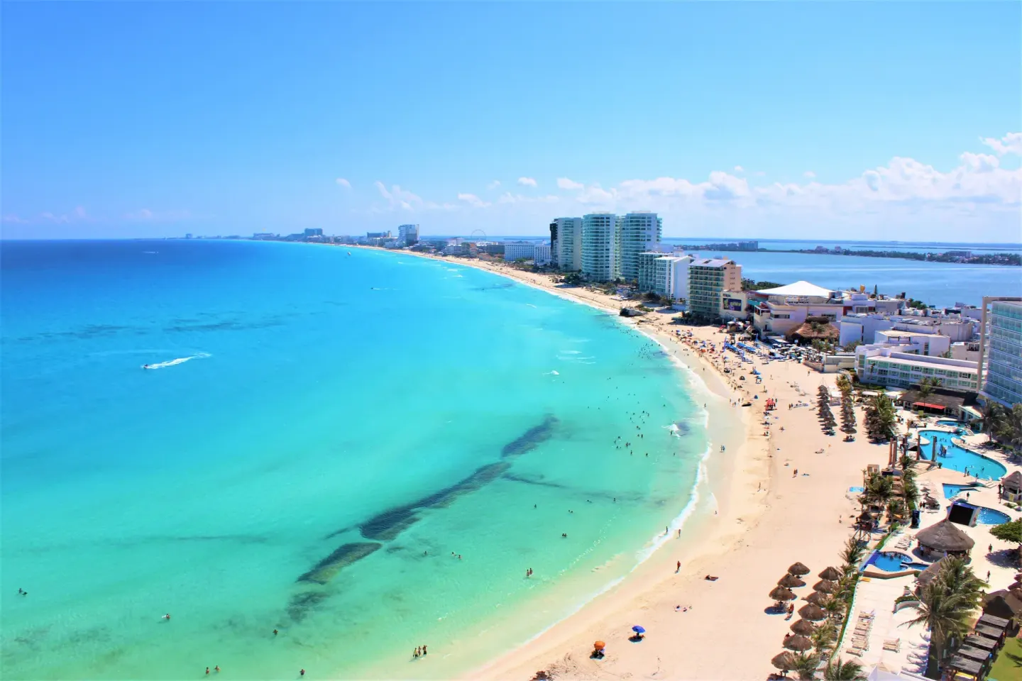 Aerial view of the turquoise Cancun shoreline by Krystal Grand Cancun.