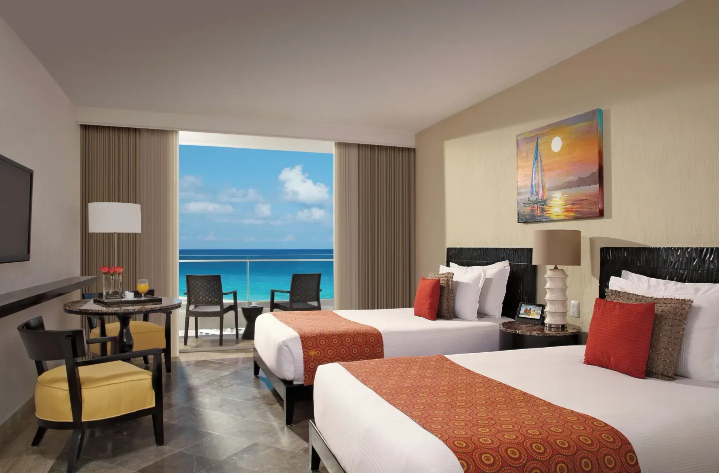 Deluxe Room Ocean View two double beds and balcony at Krystal Grand Cancun.