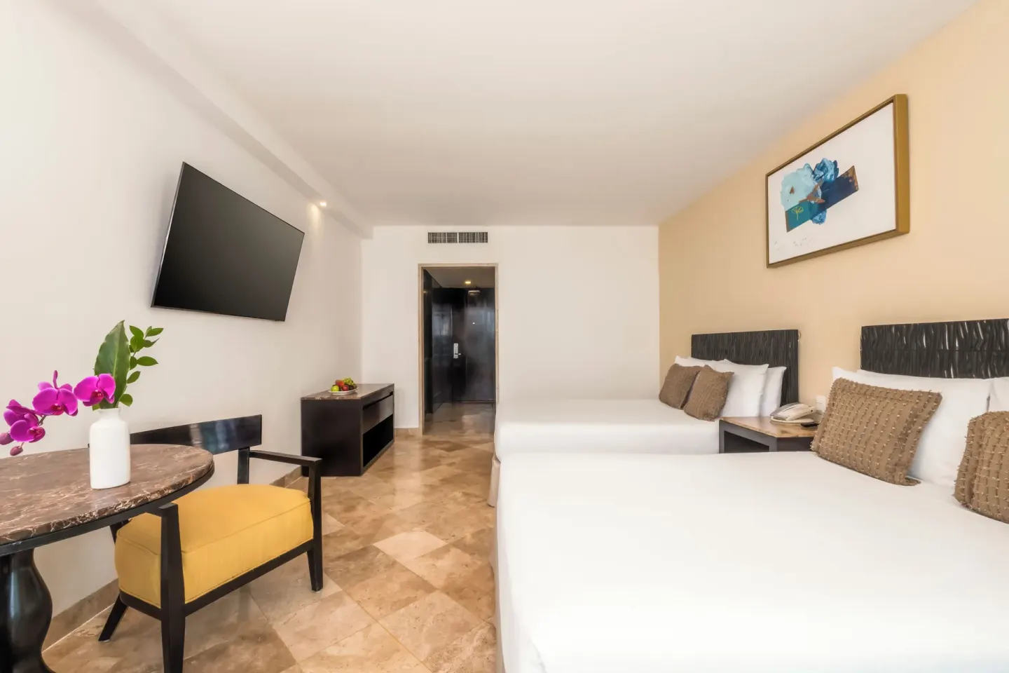 Deluxe Room Ocean View two double beds with entry view at Krystal Grand Cancun.