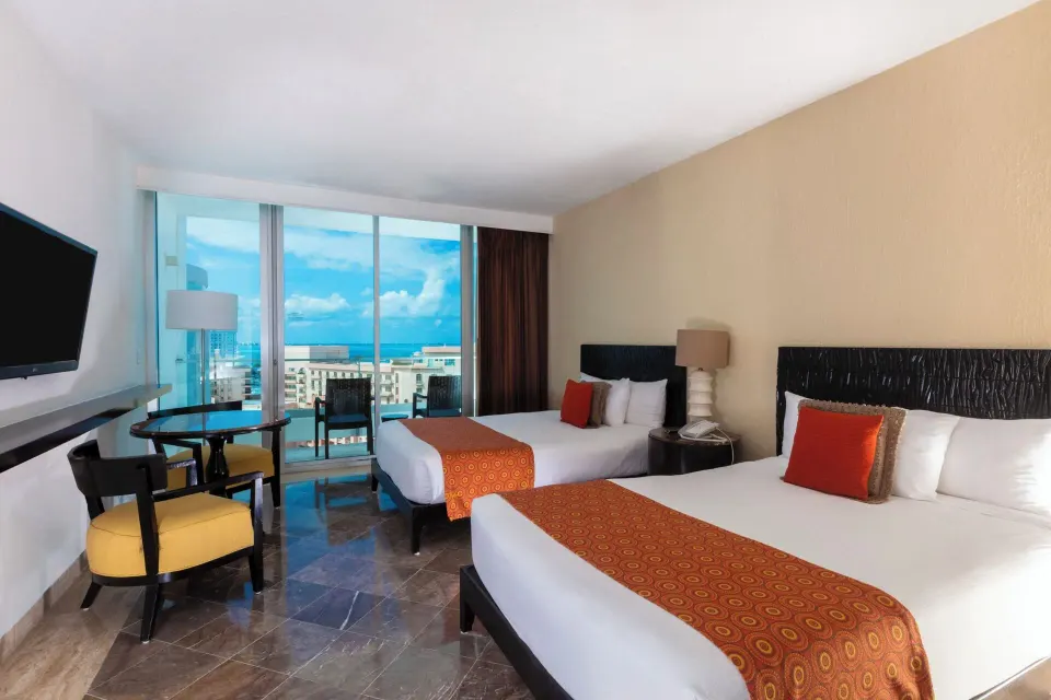 Standard Room with two beds and balcony partial ocean view at Krystal Grand Cancun.