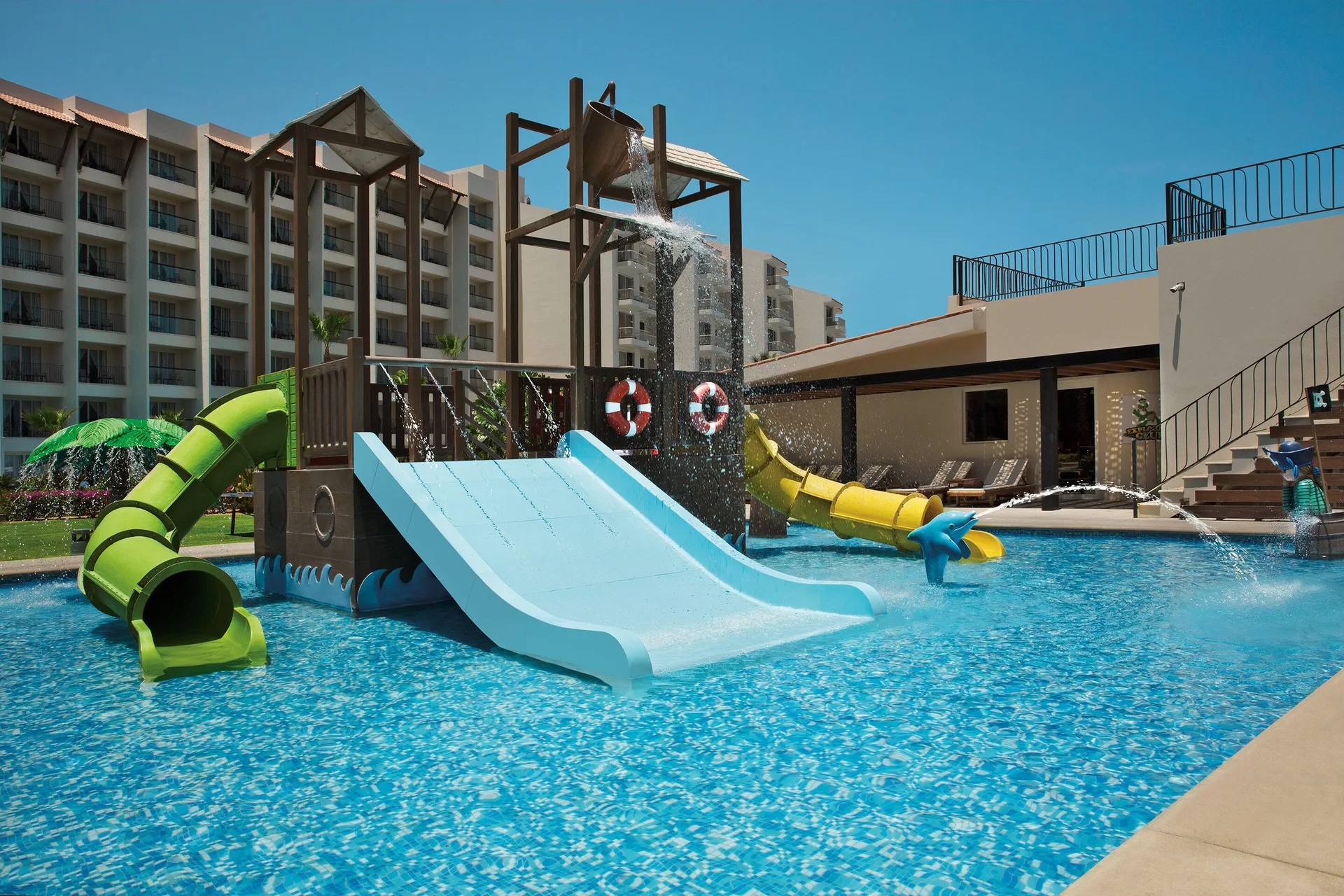 Children’s pool with slides and water features at Krystal Grand Los Cabos.