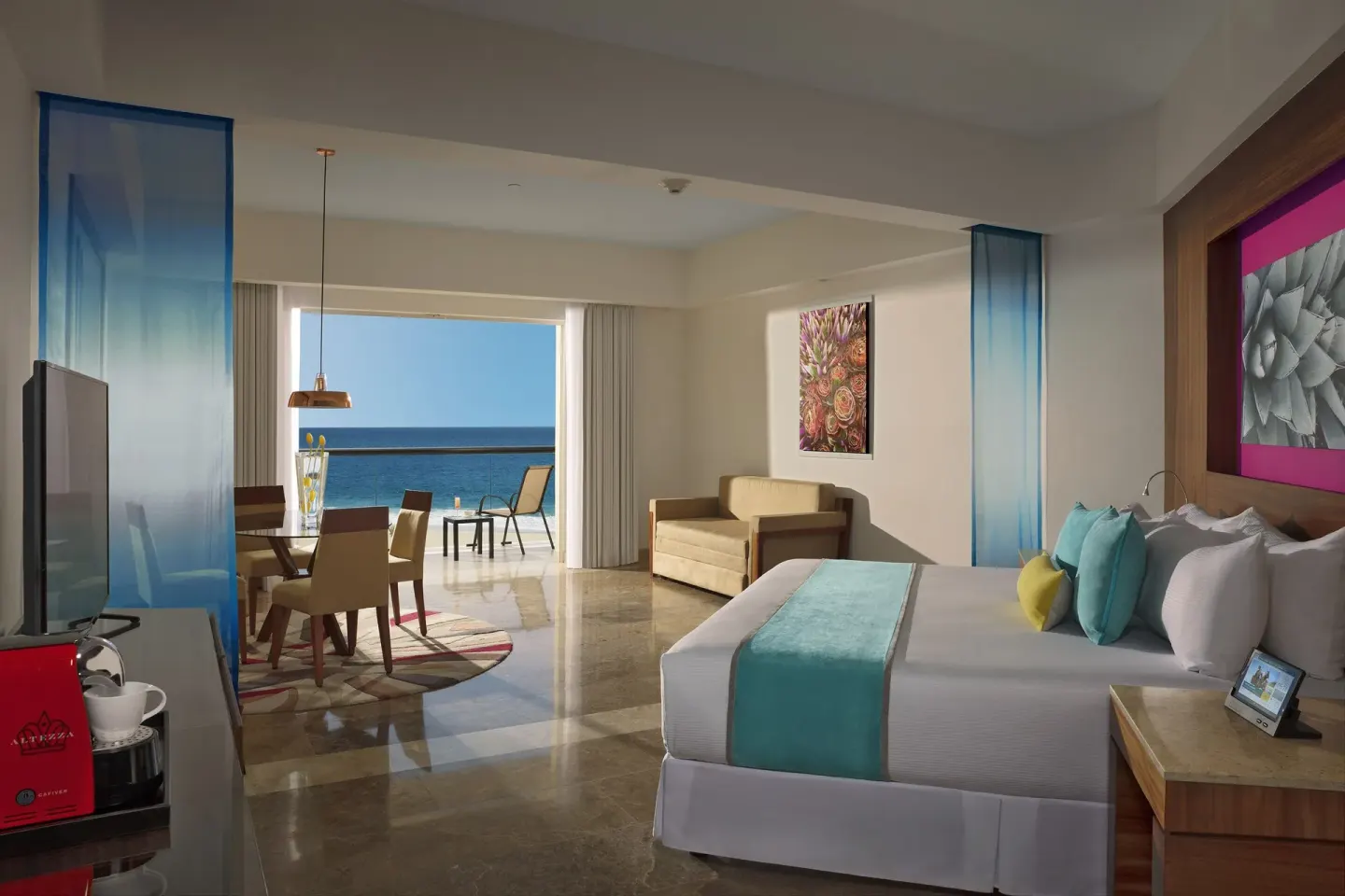 Altitude Governor Suite ocean-view king bed and balcony at Krystal Grand Los Cabos.