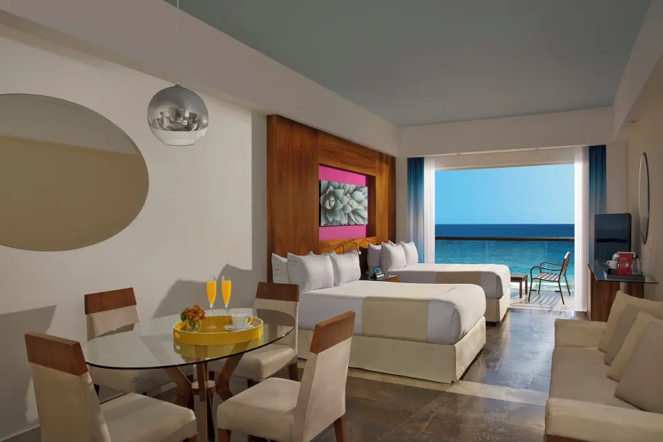 Altitude Junior Suite Ocean Front two beds and balcony at Krystal Grand Los Cabos.