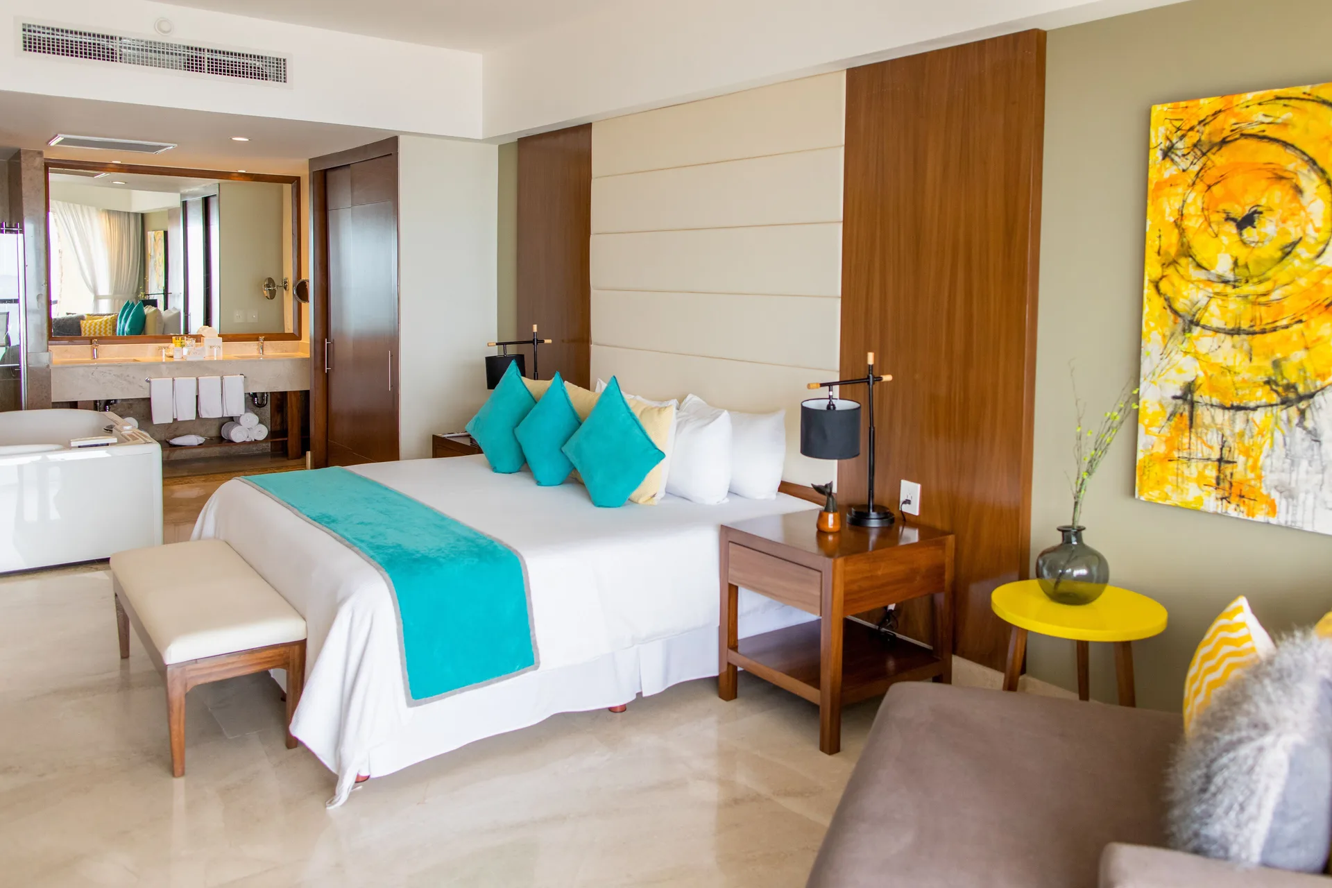 Altitude Presidential Suite Ocean View at Krystal Grand Los Cabos with king bed, vanity area, and premium finishes overlooking the Sea of Cortez on Palmilla Beach.
