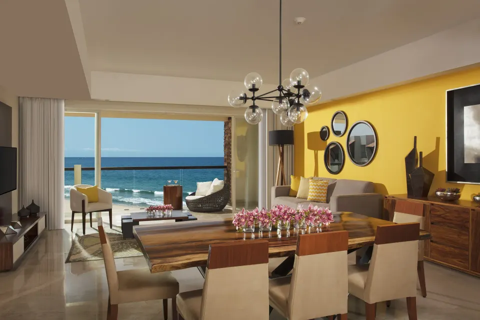 Altitude Presidential Suite living room with ocean-view terrace at Krystal Grand Los Cabos.