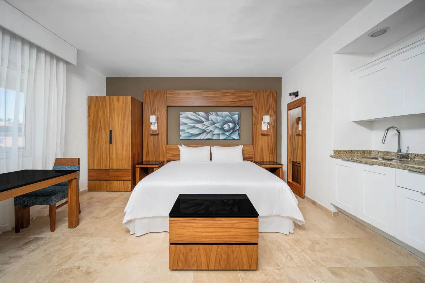 Deluxe Palmilla Garden View king room with sink area at Krystal Grand Los Cabos.