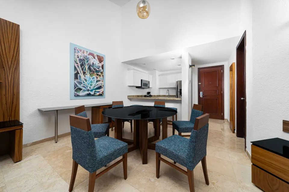 Suite Palmilla Ocean View dining area and kitchenette at Krystal Grand Los Cabos.