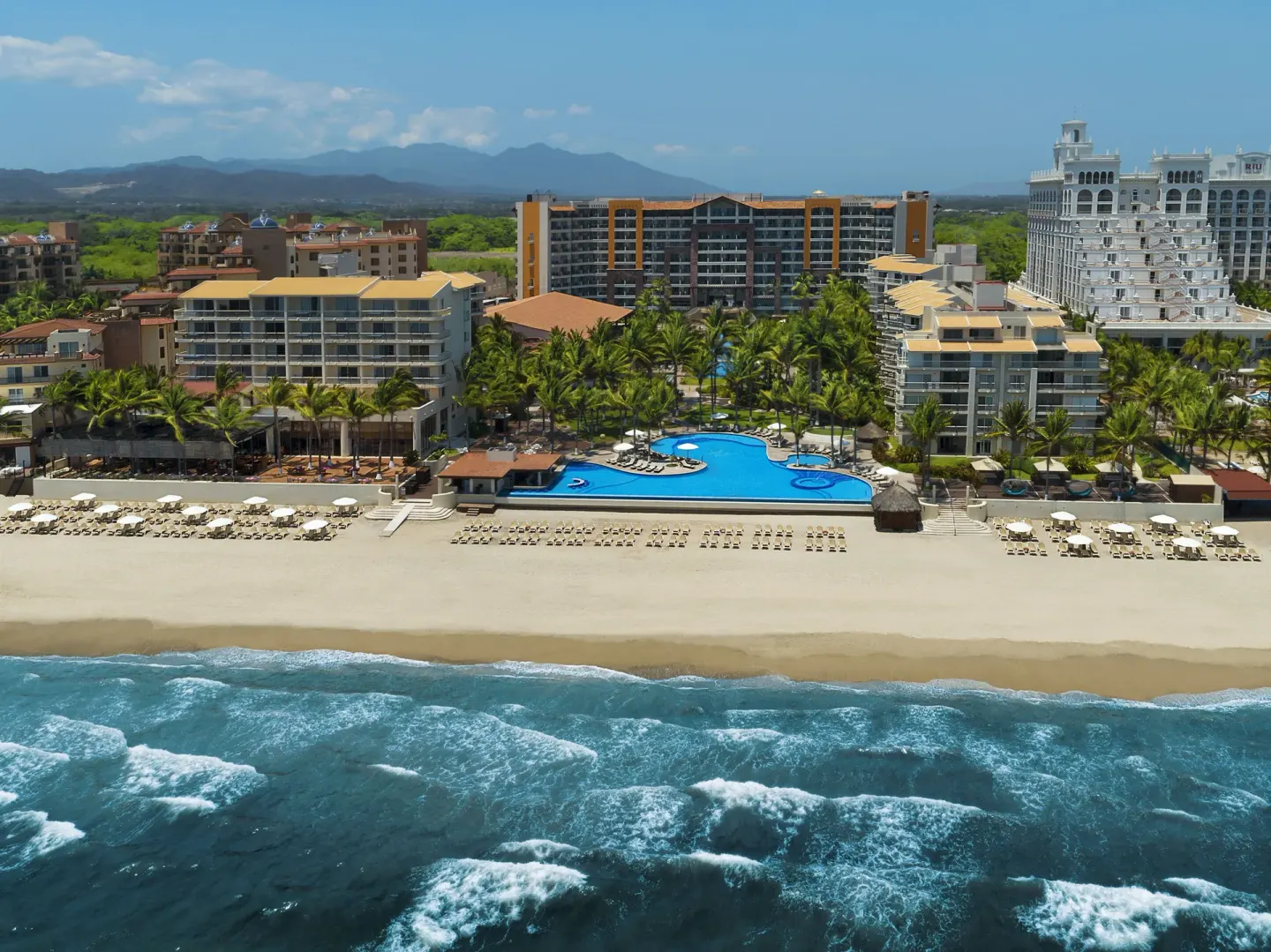 Aerial oceanfront view of Krystal Grand Nuevo Vallarta and beach.