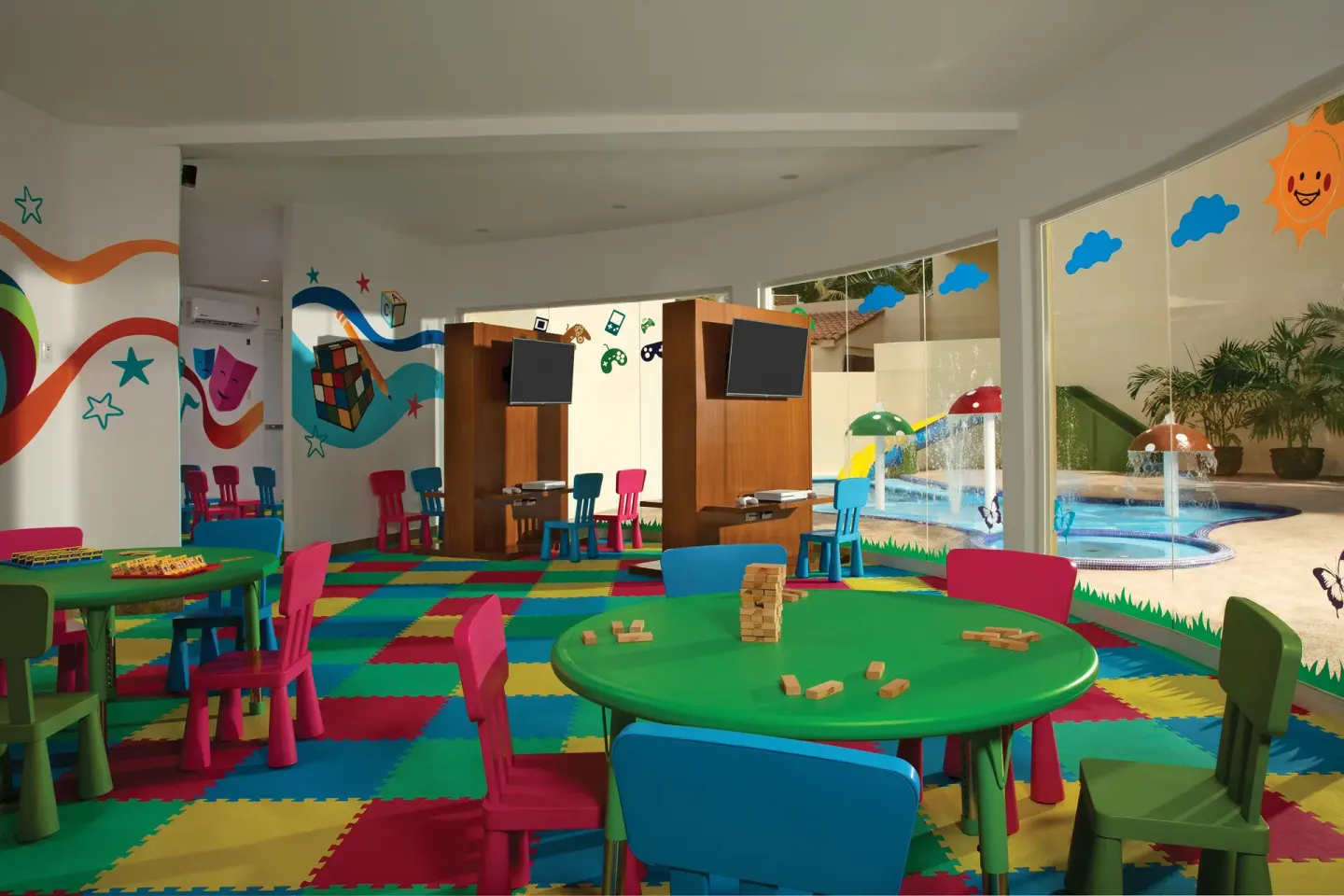Children's playroom with colorful tables and chairs at Krystal Grand Nuevo Vallarta.