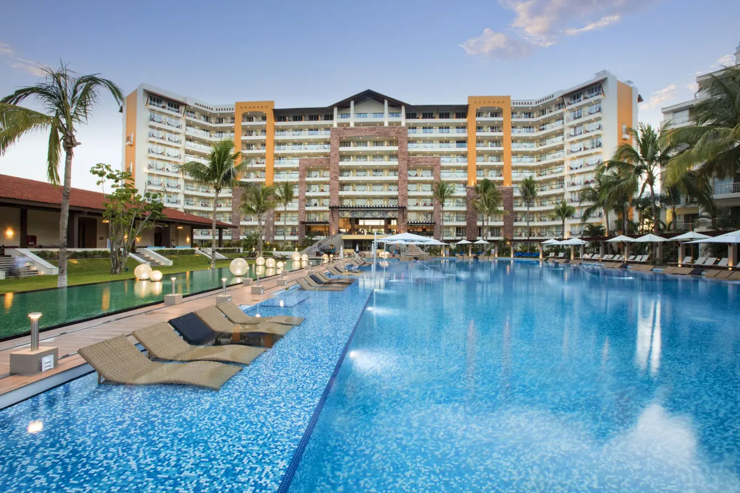 Main swimming pool and resort building at Krystal Grand Nuevo Vallarta.
