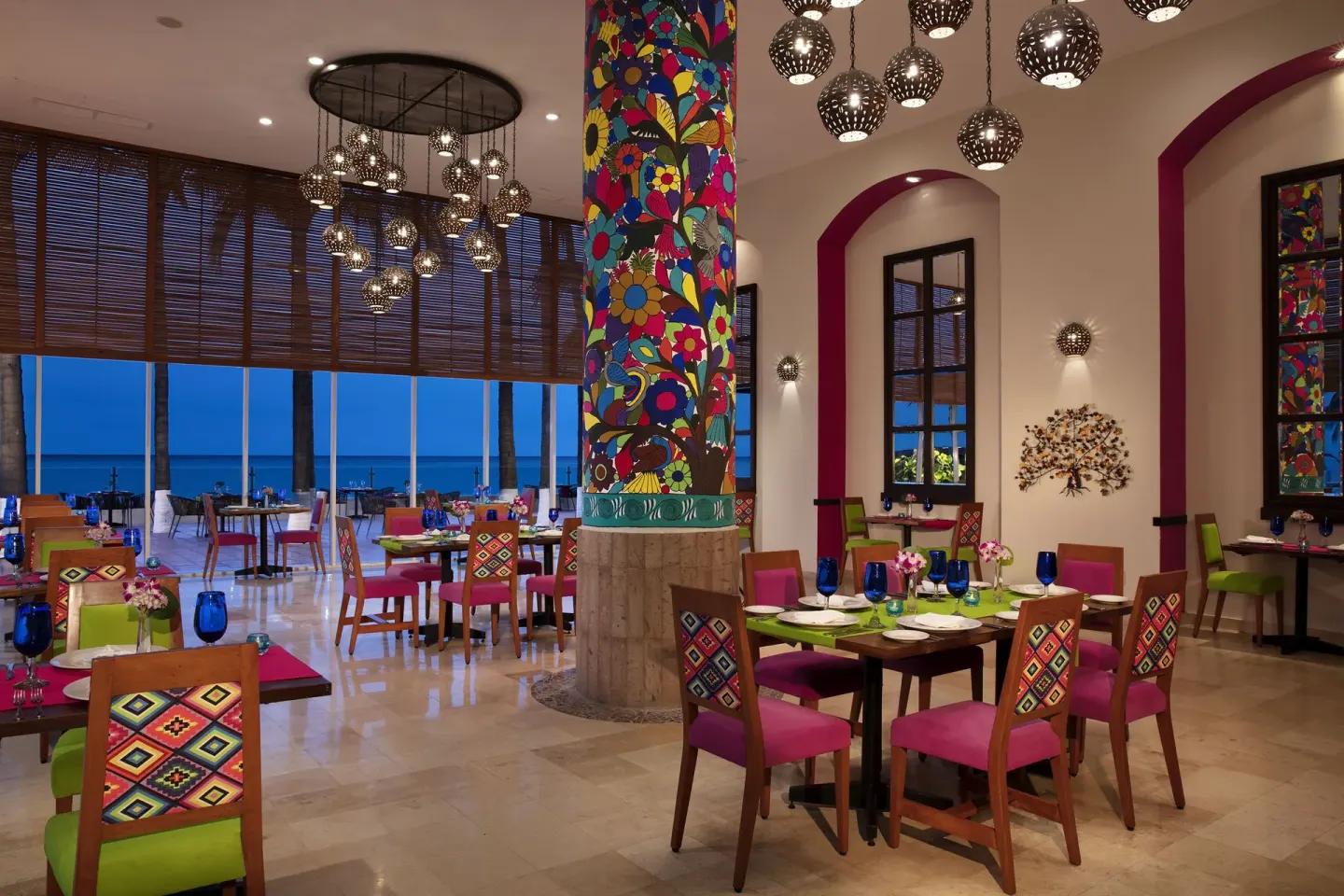 Colorful Mexican-style restaurant dining room at Krystal Grand Nuevo Vallarta.