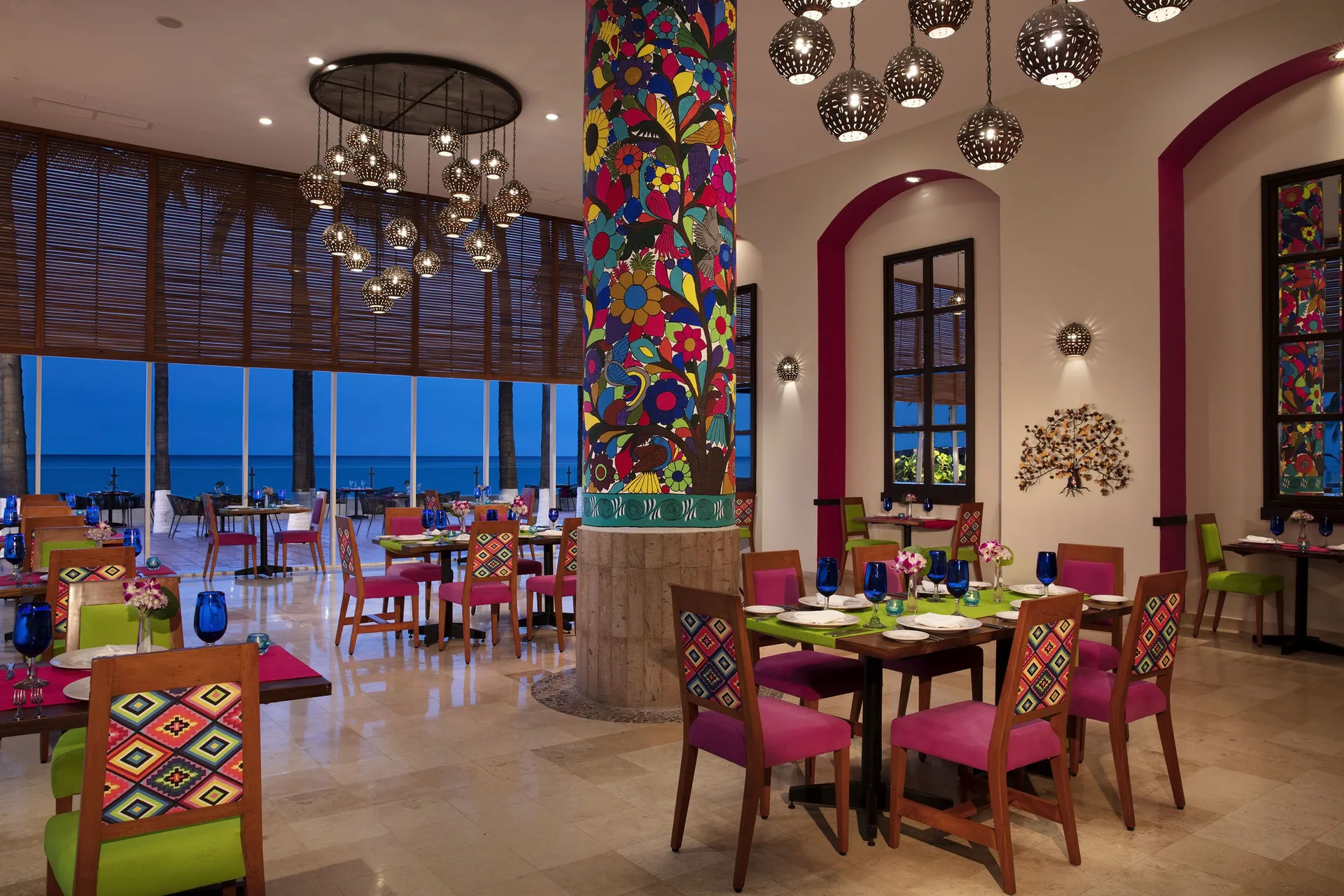 Colorful Mexican-style restaurant dining room at Krystal Grand Nuevo Vallarta.