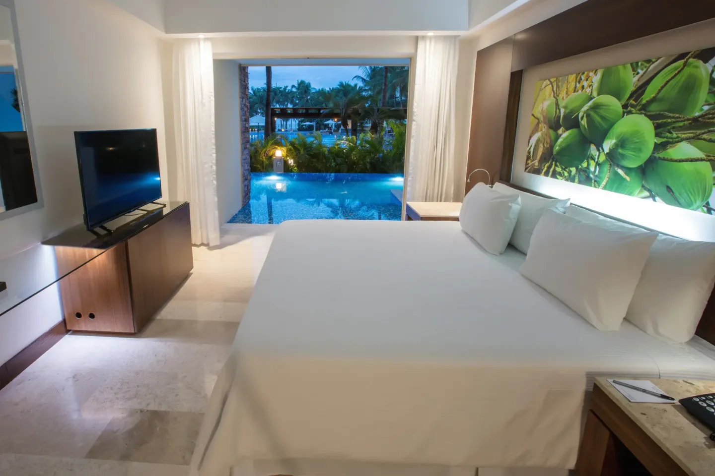 Altitude Club Junior Suite Swim Out king bed and terrace pool at Krystal Grand Nuevo Vallarta.