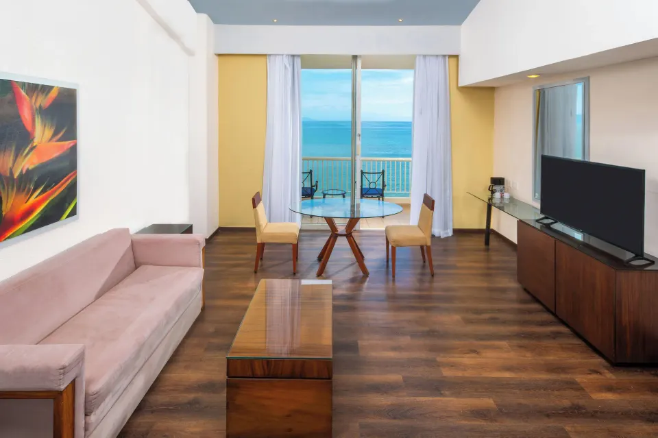 Junior Suite Ocean View living room facing the balcony at Krystal Grand Nuevo Vallarta.