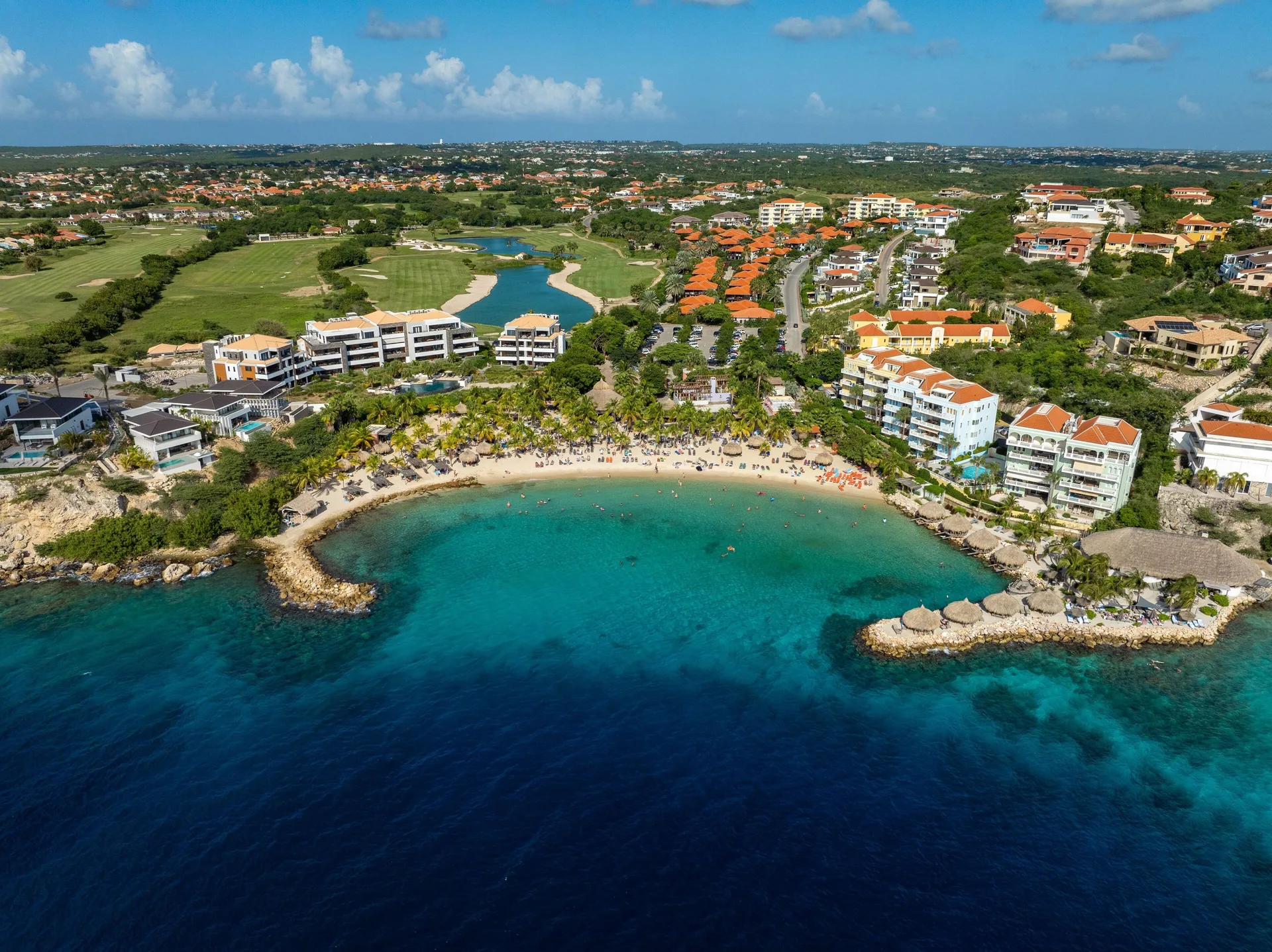 Blue Bay Curacao Golf and Beach Resort with beachfront setting, golf course, and family villas