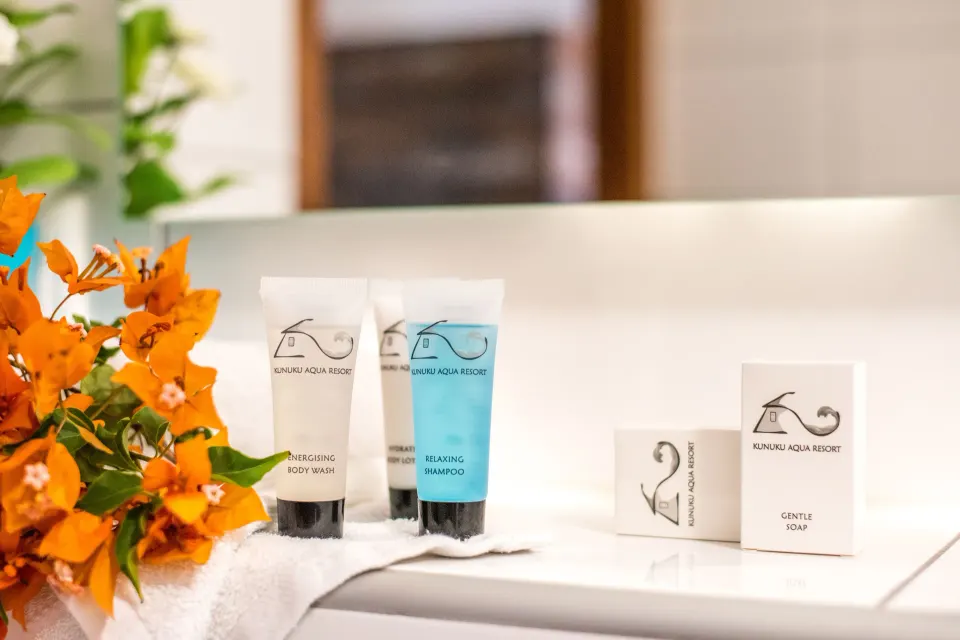 Standard Room bathroom amenities on a counter at Kunuku Resort Curacao.