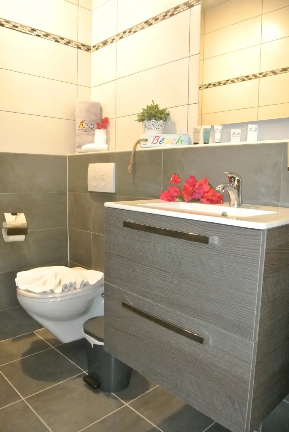 Standard Room bathroom vanity and toilet at Kunuku Resort Curacao.