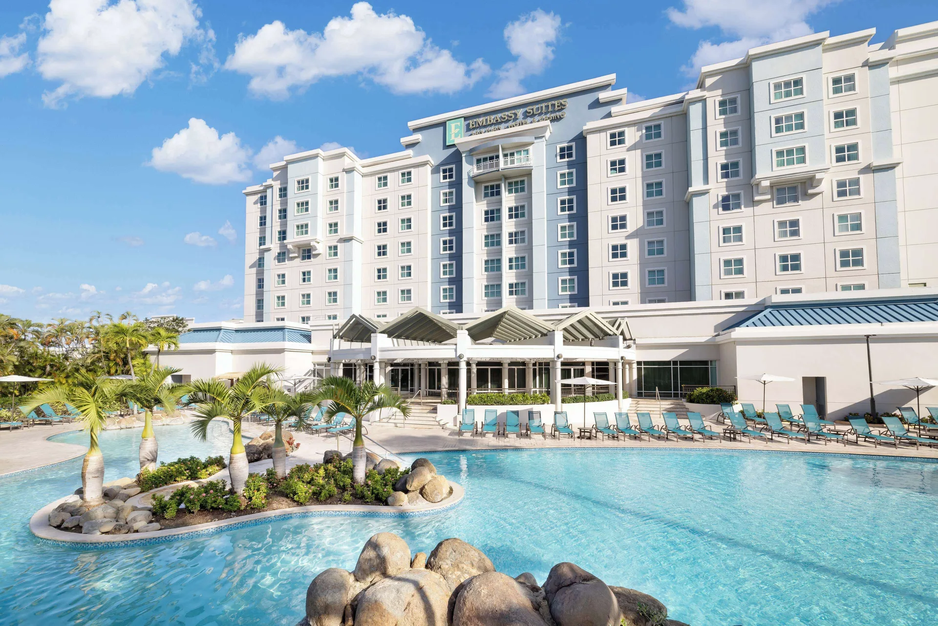 Embassy Suites San Juan all-suite hotel with family-friendly amenities and relaxed pool area