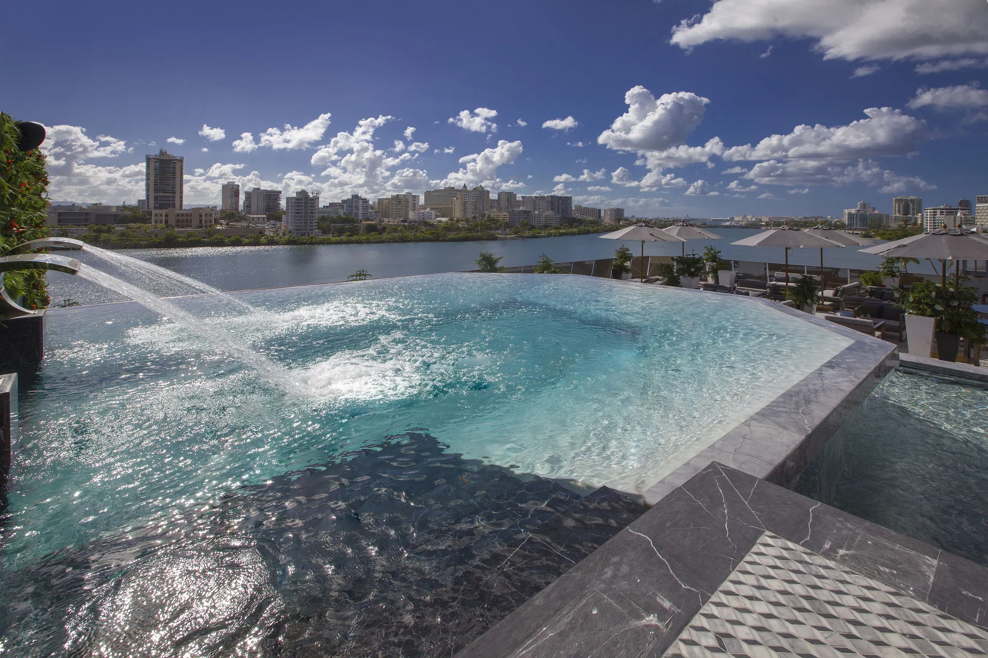 OLV Fifty Five adults-only boutique hotel with rooftop pool and lagoon-facing modern design