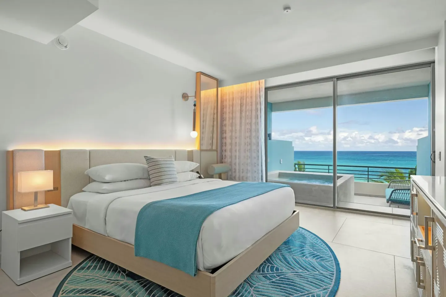 Ocean-view king bed guest room with balcony at La Concha Resort, Puerto Rico.