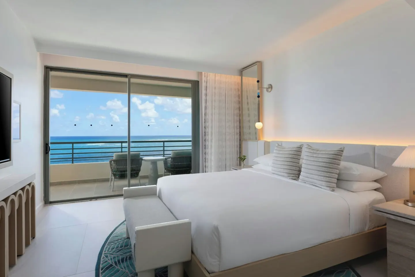King bedroom with balcony and ocean view at La Concha Resort, Puerto Rico.