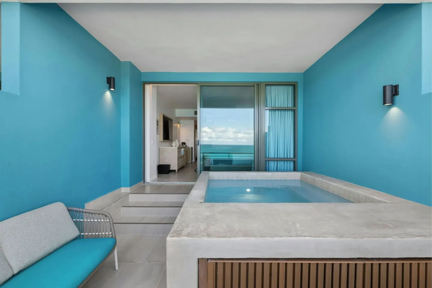 Covered terrace with plunge pool and seating at La Concha Resort, Puerto Rico.
