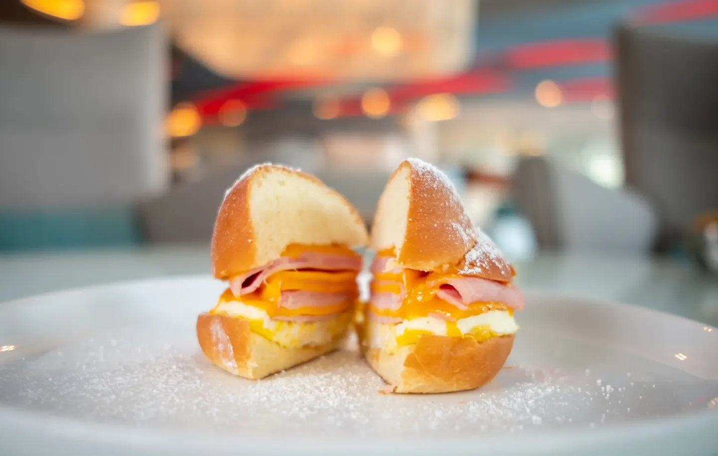 Breakfast sandwich on a white plate at La Concha Resort, Puerto Rico.