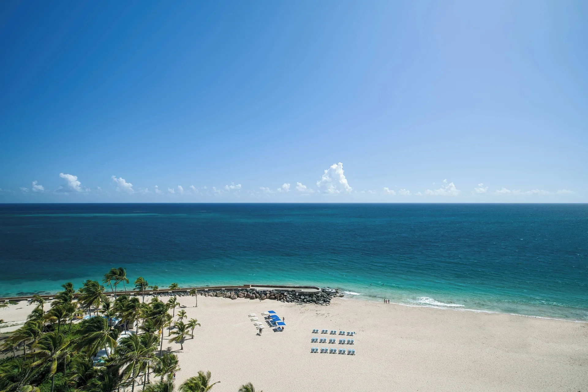 Ocean and beach view from a junior suite balcony at La Concha Resort, Puerto Rico.