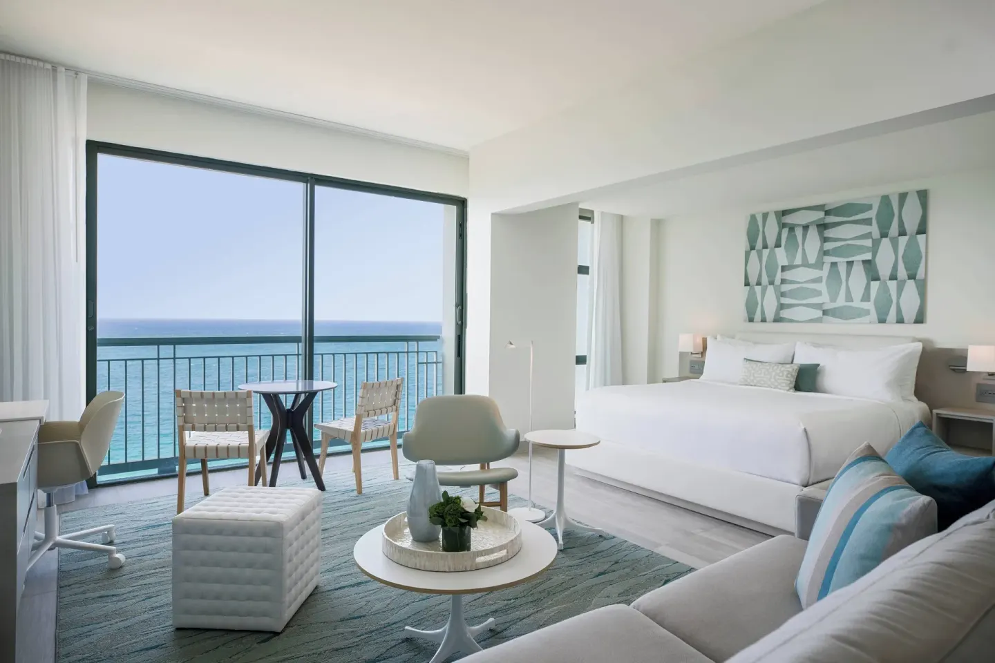 Junior suite with king bed, sofa bed, balcony, and ocean view at La Concha Resort, Puerto Rico.