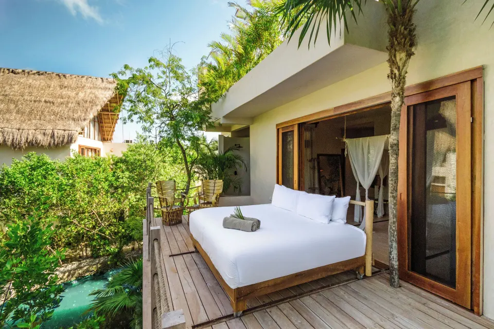 Outdoor daybed and deck of the Cenote Master Suite – Jungle Side at La Valise Tulum