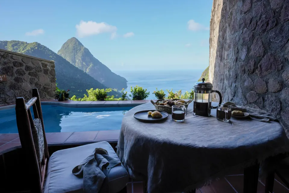 Petit Piton Suite terrace breakfast by plunge pool at Ladera Resort.