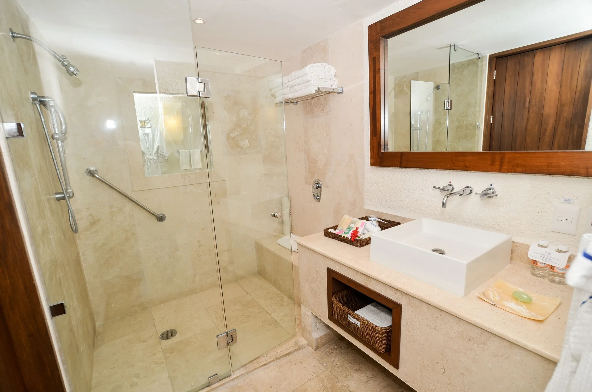 Deluxe Grand Bed bathroom vanity and glass shower at Las Brisas Ixtapa.