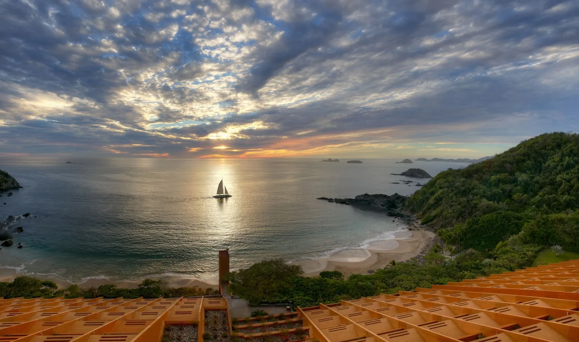Ocean sunset view from a Deluxe Grand Bed room at Las Brisas Ixtapa.